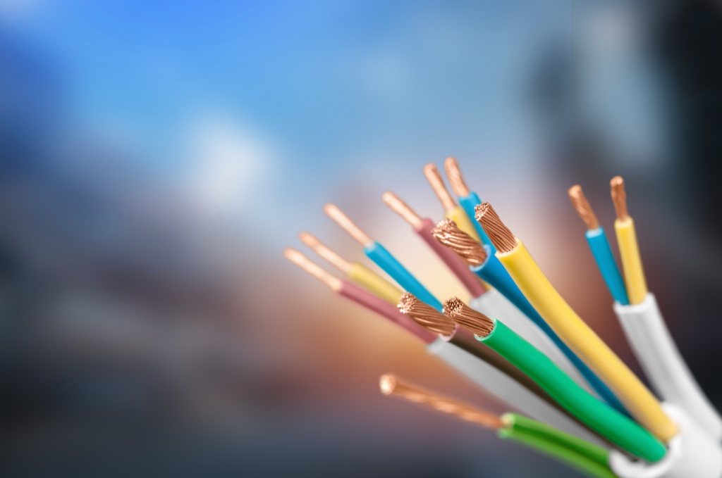 Electric screened cable with many wires isolated on grey